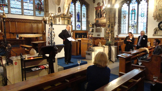 Sir Norman Palmer, CBE, addresses the faithful at the relaunch of Art Resolve at St. Olave’s Church in the City of London in September. Image Auction Central News.